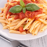 Pasta with tomato sauce and basil
